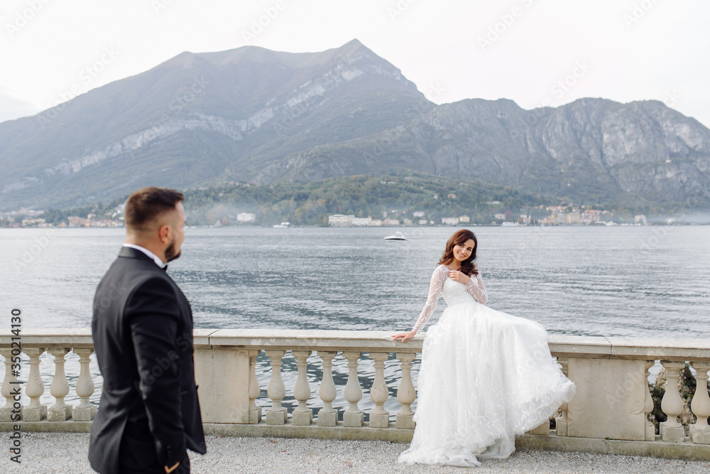 Happy wedding couple in Como Lake, Italy Happy wedding couple in Como Lake, Italy