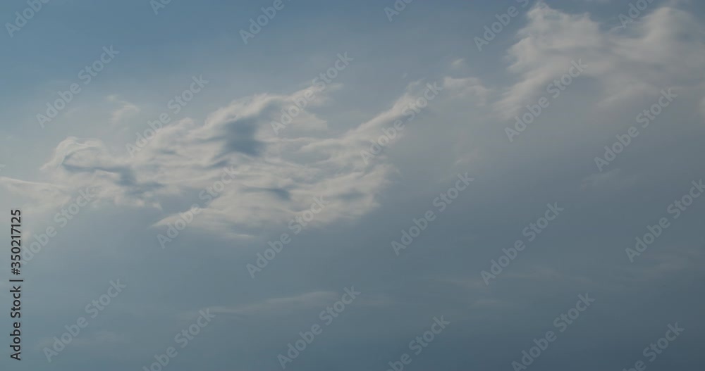 Wavy graceful clouds on a blue timelapse. Wavy graceful clouds on a blue timelapse.