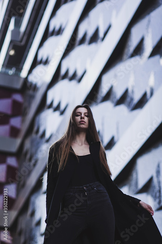 Stylish woman wearing black and jeans