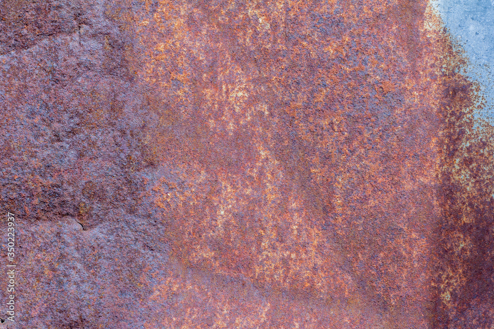 Rusty background.Rust.Texture of old rusty iron.Red-brown rust covered the metal. Rusty background.Rust.Texture of old rusty iron.Red-brown rust covered the metal.