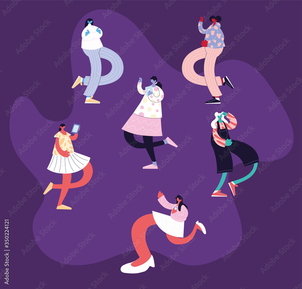 young women using technological gadgets young women using technological gadgets
