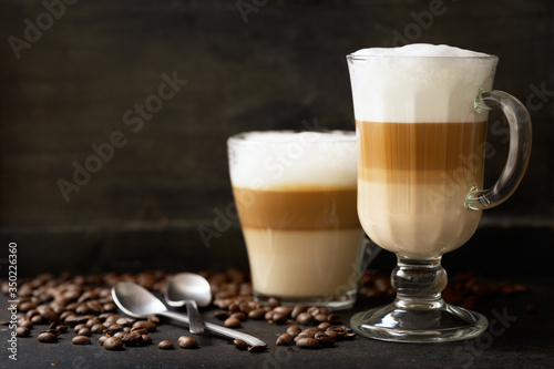 Fototapeta Naklejka Na Ścianę i Meble -  glasses of latte macchiato coffee