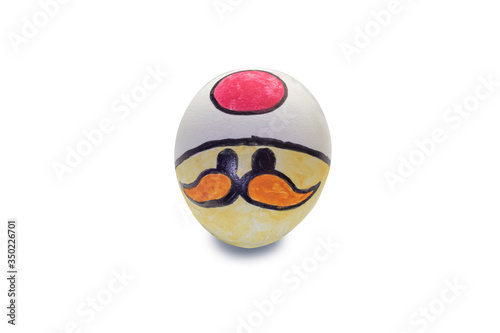 Colorful painted mushroom Easter egg in isolated background