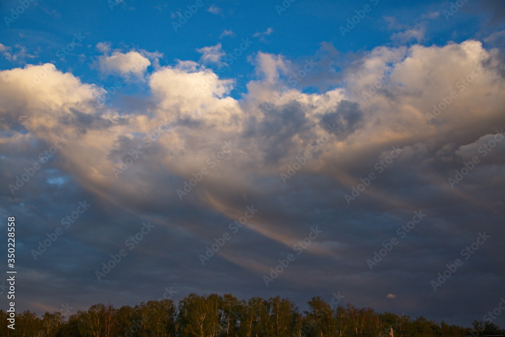 Sunset in the sky over the country settlement, Moscow region, Russia. Sunset in the sky over the country settlement, Moscow region, Russia.