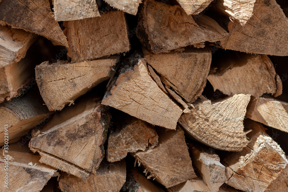 a pile of chopped wood. Woodpile with firewood a pile of chopped wood. Woodpile with firewood