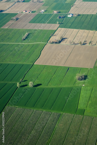 Aerial view of green fields in italian country - abstract background