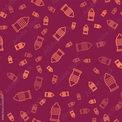 Brown line Condom safe sex icon isolated seamless pattern on red background. Safe love symbol. Contraceptive method for male. Vector Illustration