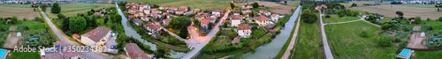 Beautiful panoramic aerial view of town in Tuscany, Italy. Homes and countryside at sunset