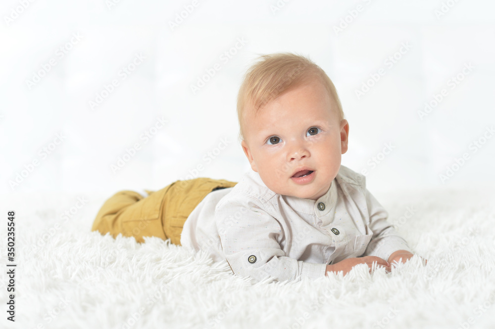 Portrait of cute beautiful baby boy on bed Portrait of cute beautiful baby boy on bed
