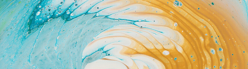 art photography of abstract marbleized effect background. Aqua, blue, gold and white creative colors. Beautiful paint