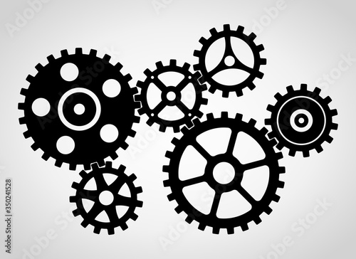 Silhouette of a mechanical gears set, large sprockets 25 teeth, small sprockets 15 teeth. Vector illustration. photo