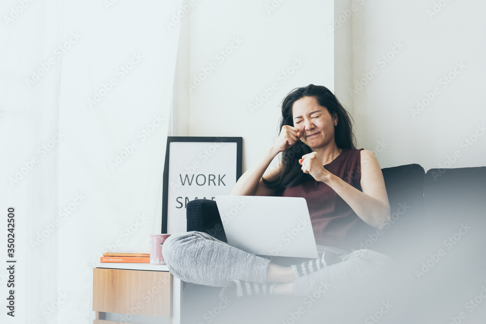 serious people frustrated exhausted work stress concept.asian woman holding hands on face feeling tired suffering working job in work place.concept global economic and health problems serious people frustrated exhausted work stress concept.asian woman holding hands on face feeling tired suffering working job in work place.concept global economic and health problems