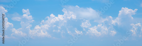 Blue sky and white clouds or cloudscape. © Phongsak