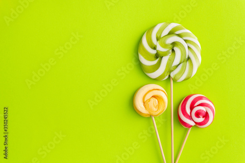 Lollypops yammy candy on a colored background