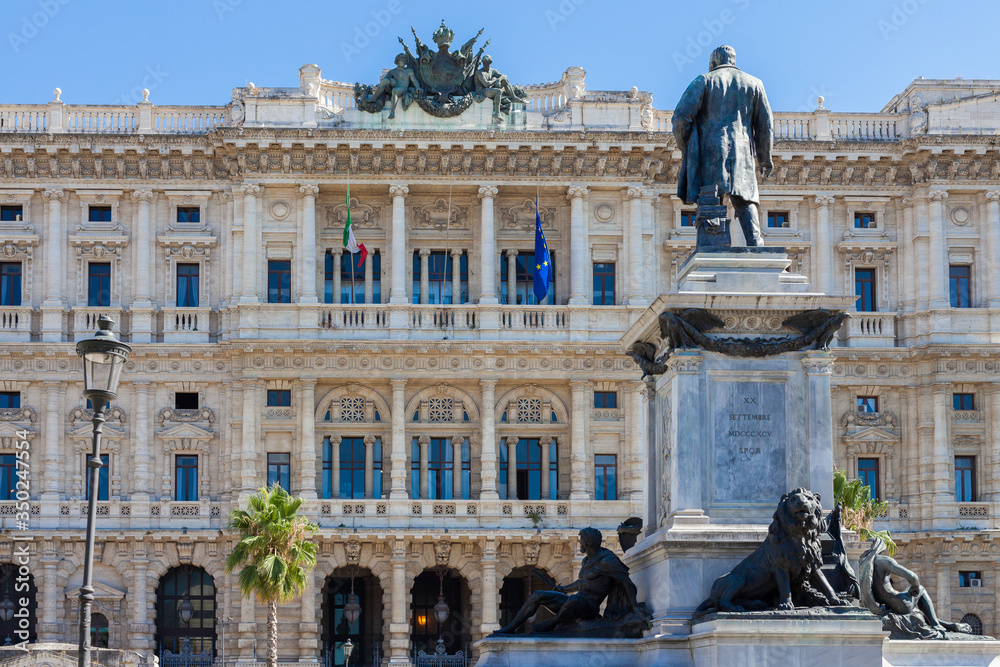 ROME, ITALY - 2014 AUGUST 18. View of Palazzo di Giustizia. Palace of Justice in Rome, and monumento statua Camillo Benso Conte di Cavour.