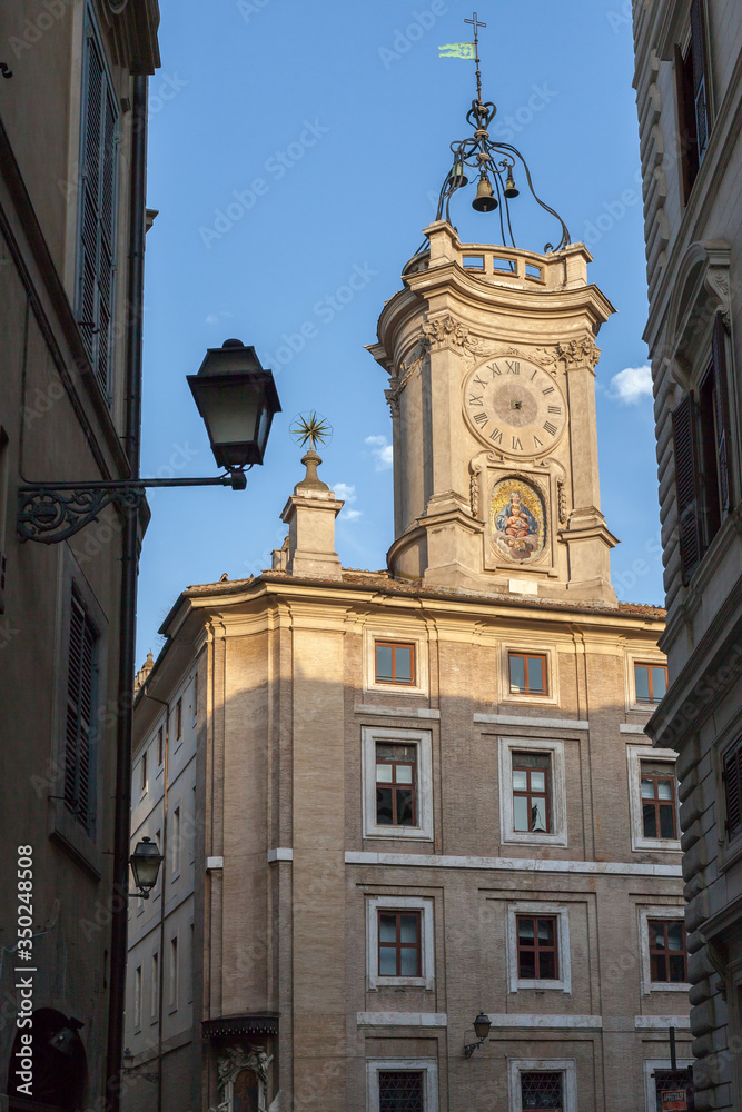 ROME, ITALY - 2014 AUGUST 19. Old architecture building with clock tower in Rome. 