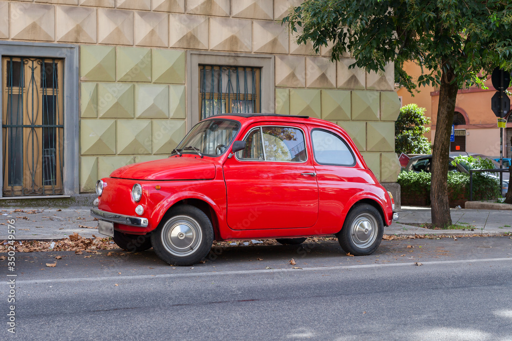 ROME, ITALY - 2014 AUGUST 19. Vintage car parked in the street in Rome, Italy.