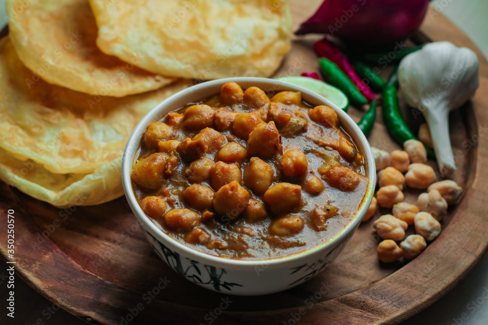 Chole Bhture or Chana masala is a Famous Indian dish originated initially from eastern Uttar Pradesh in the northern part of the Indian subcontinent. Chole Bhture or Chana masala is a Famous Indian dish originated initially from eastern Uttar Pradesh in the northern part of the Indian subcontinent.