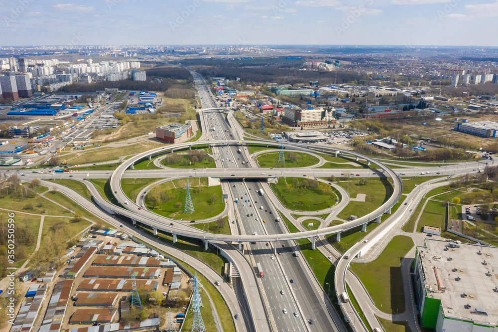 Top view of the multi-level road junction in Moscow from above, car traffic and many cars, the concept of transportation. road junction at the intersection of the Kashirskoe highway and ring road