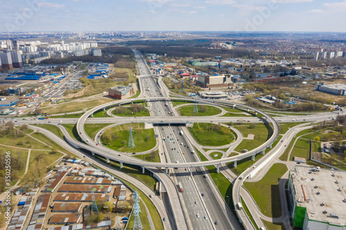 Top view of the multi-level road junction in Moscow from above, car traffic and many cars, the concept of transportation. road junction at the intersection of the Kashirskoe highway and ring road
