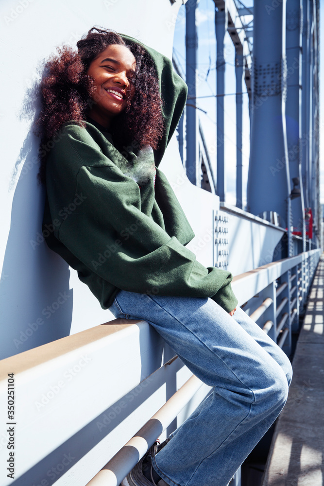 Φωτογραφία young cute teenage african girl in industrial zone happy smiling having fun, big