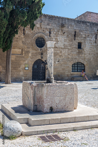 Fountain with a side of the capital of the island photo