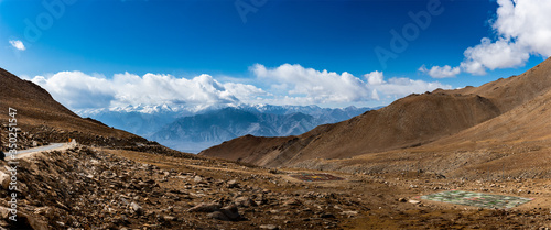 Landscape of snow mountains in Leh Ladakh with cloudy sky © sittitap