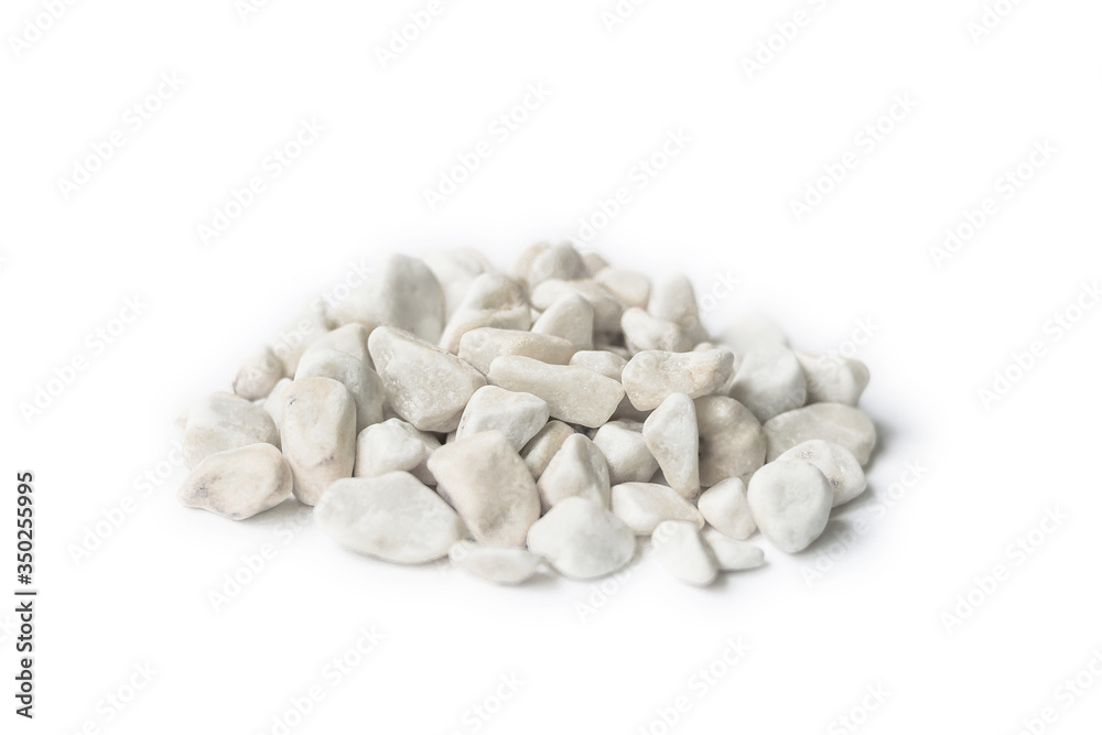 Marble rubble on a white background in the form of a pile of stones. Marble crushed stone fraction is used in landscape design, construction, and aquarium soil Marble rubble on a white background in the form of a pile of stones. Marble crushed stone fraction is used in landscape design, construction, and aquarium soil