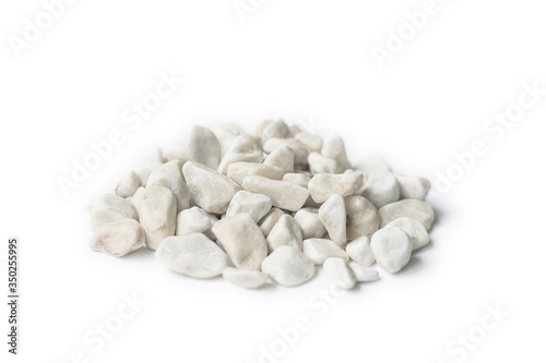 Marble rubble on a white background in the form of a pile of stones. Marble crushed stone fraction is used in landscape design, construction, and aquarium soil