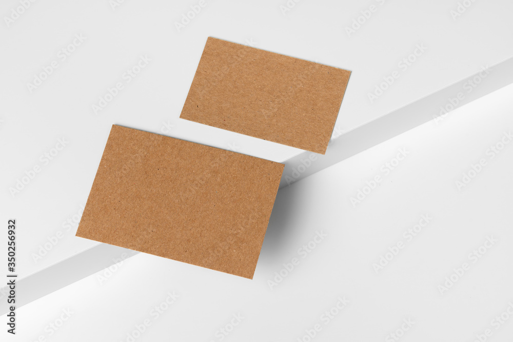 Empty craft business cards on white background. Close up. Empty craft business cards on white background. Close up.