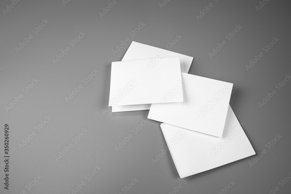 Blank portrait mock-up paper. brochure magazine isolated on gray, changeable background / white paper isolated on gray
