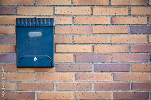 mailbox on the facade of the house