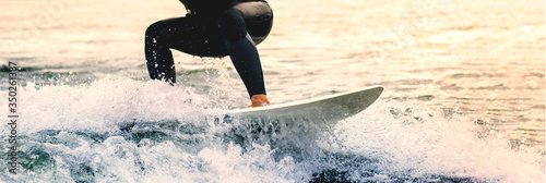 Wallpaper Mural Dynamic water sports enthusiast shifts his focus on the wakeboard to keep the balance steadfastness fear water learning challenge Torontodigital.ca