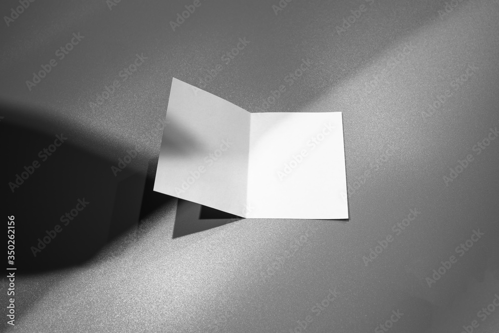 Blank portrait mock-up paper. brochure magazine isolated on gray, changeable background / white paper isolated on gray Blank portrait mock-up paper. brochure magazine isolated on gray, changeable background / white paper isolated on gray