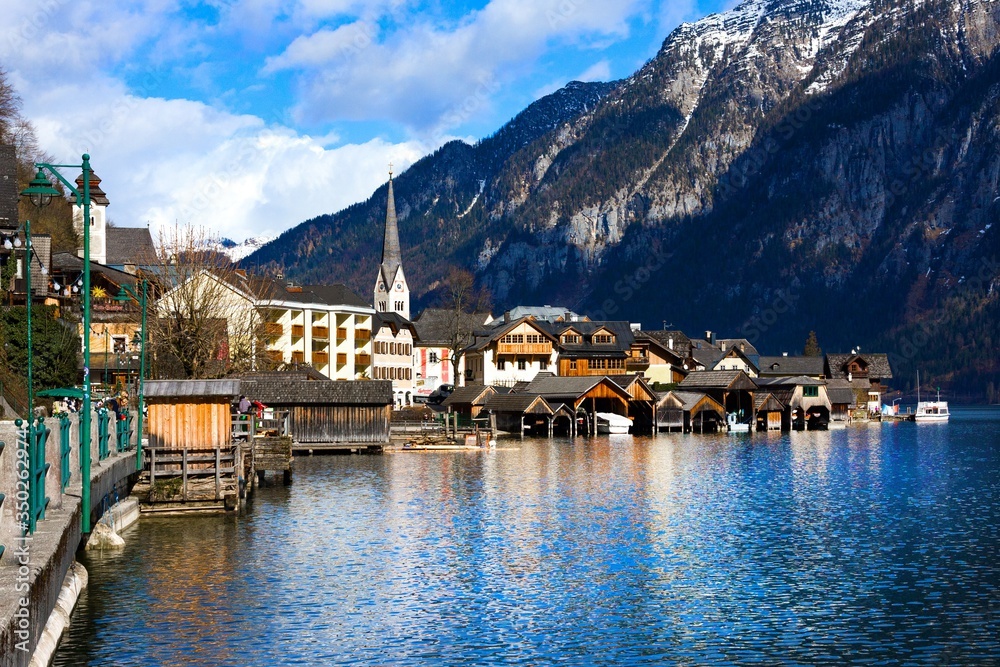 Hallstatt - UNESCO Heritage village against mountain and lake in winter. It`s most popular, romance and dream of destination for many tourists. Austria.