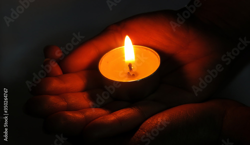 Hand holding a candle, Candle Light, Beautiful Candle in Hand. hand with a candle. 