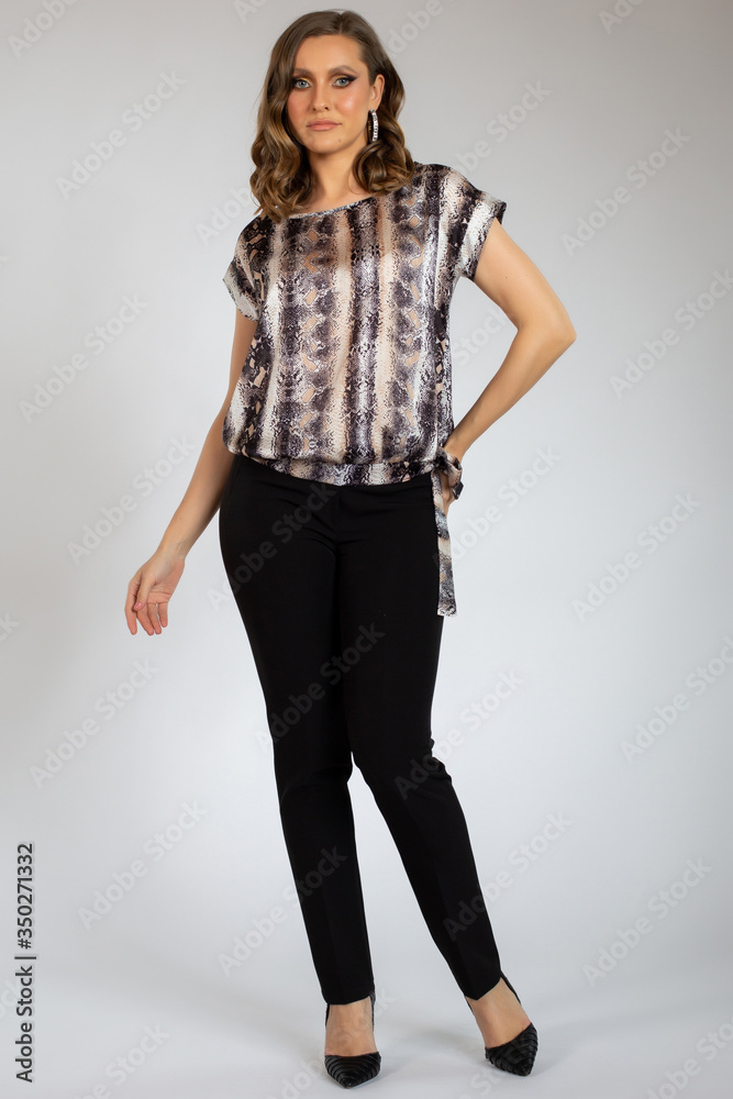 beautiful young girl posing in black pants and shirt beautiful young girl posing in black pants and shirt