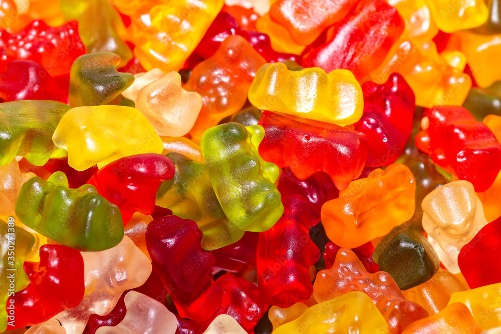 Wine gummy bears of different colors in close-up. Wine gummy bears of different colors in close-up.