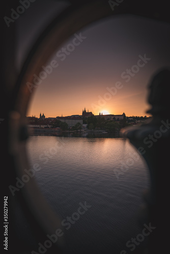Sunset over Prague castle and Vltava river
