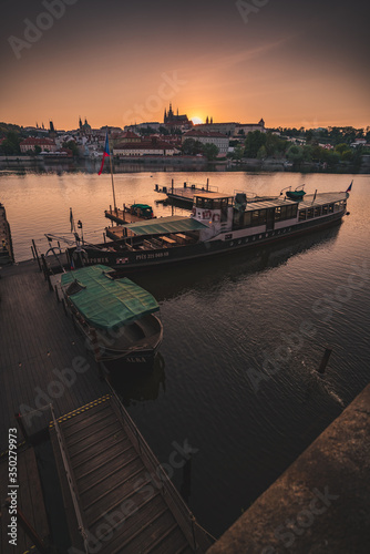Sunset over Prague castle and Vltava river