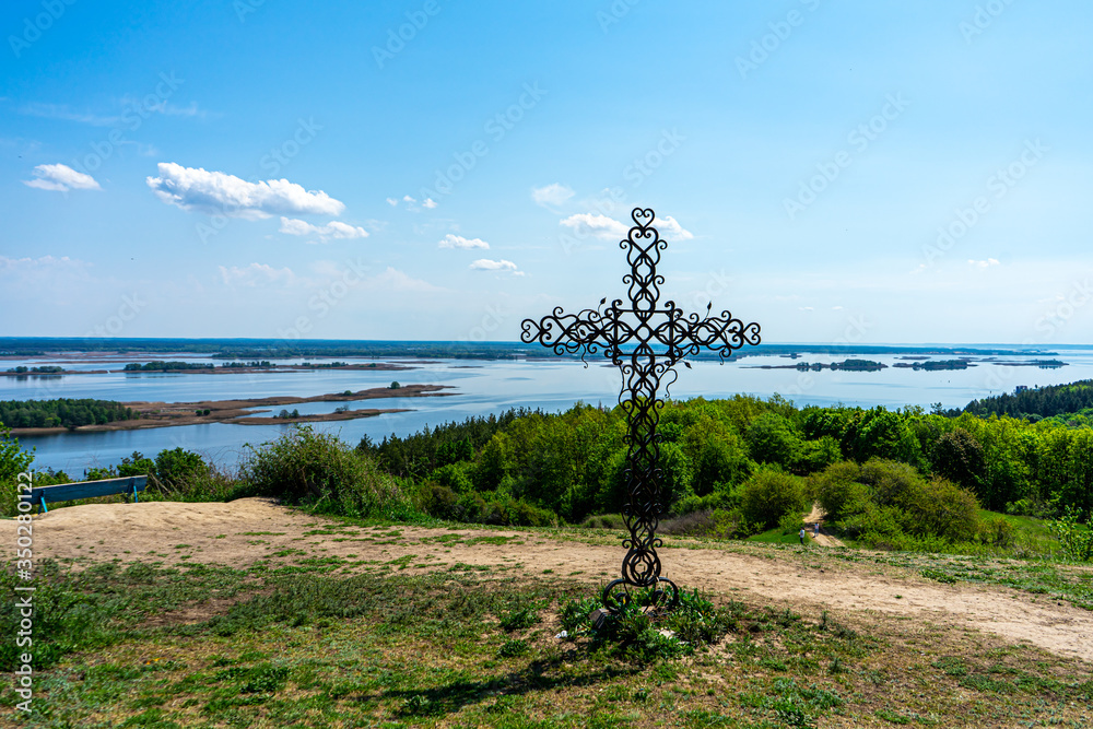 VYTACHIV, UKRAINE - MAY 3,2020: Christ near wood church in Vytachiv, Ukraine on May 3, 2020.