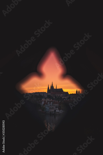 Sunset over Prague castle and Vltava river