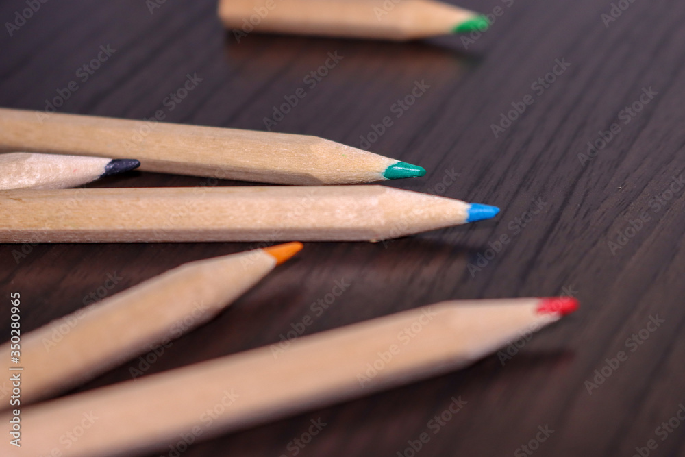 colored pencils on the table colored pencils on the table