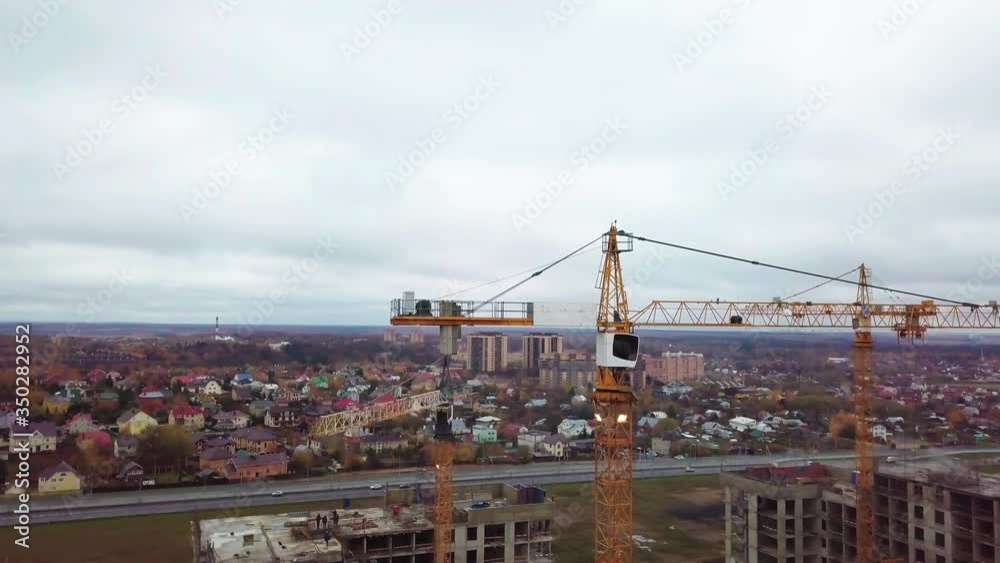 Construction of residential buildings. Construction site from a height. Aerial view construction site. Work of special equipment. Aerial view of the construction site. Aerial view of the buildings. Construction of residential buildings. Construction site from a height. Aerial view construction site. Work of special equipment. Aerial view of the construction site. Aerial view of the buildings.