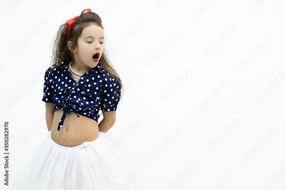 Little model with open mouth looking somewhere. Little model with open mouth looking somewhere.