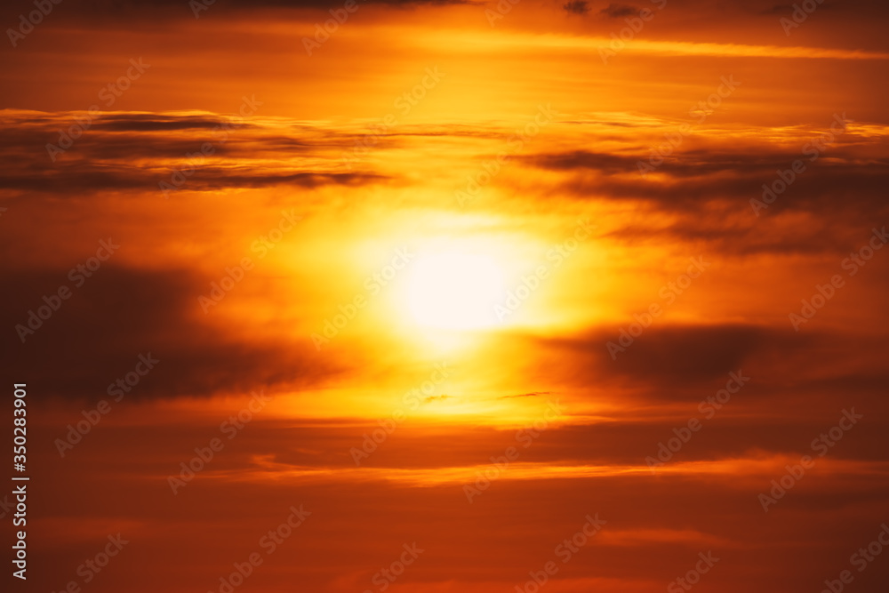 Obraz premium Sunset dramatic sky clouds with sunbeam