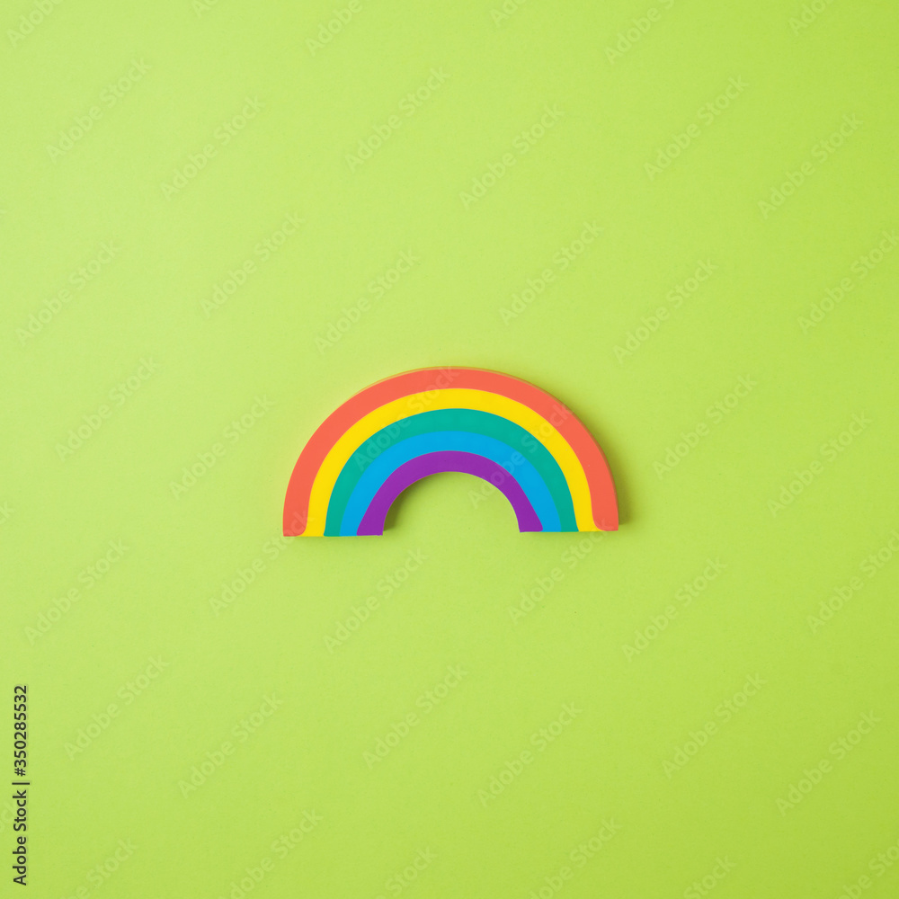 Rainbow symbol over green background. Concept of hope during coronavirus COVID-19 pandemic Rainbow symbol over green background. Concept of hope during coronavirus COVID-19 pandemic