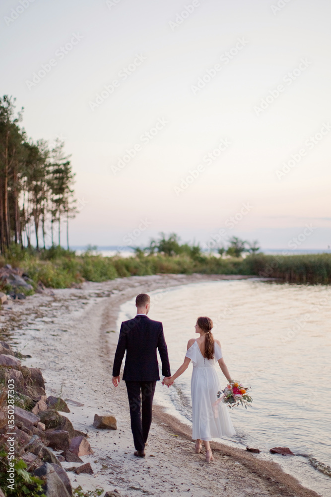 Bride and groom walk back