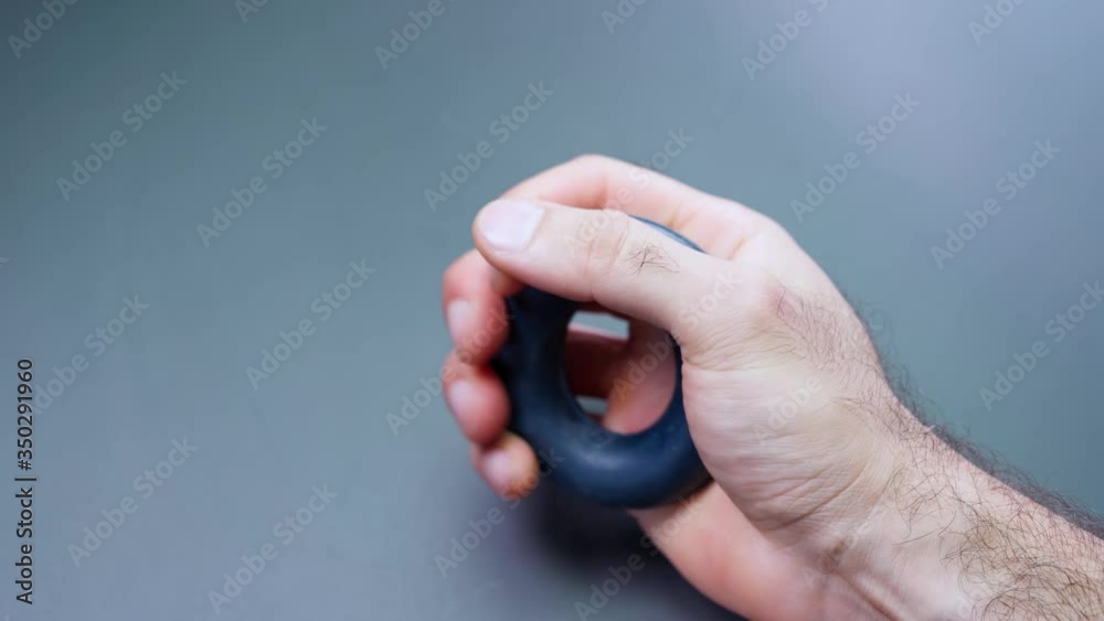 Exercise. Hand squeezing the espander Exercise. Hand squeezing the espander