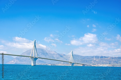 The famous cable bridge Charilaos Trikoupis in Rio Antirio Greece on a sunny day with a blue sky